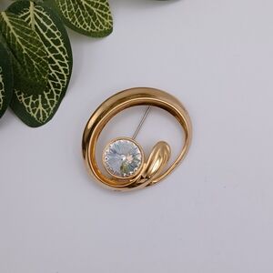 Gold Swirl Brooch with Crystal Accent